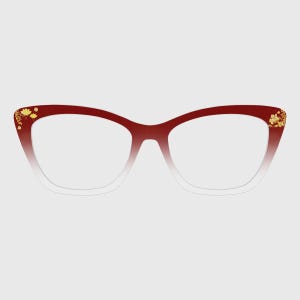 Puede incluir: Gafas de ojo de gato rojas y blancas con detalles florales dorados en las esquinas superiores. Las monturas hacen una transición de rojo oscuro en la parte superior a blanco transparente en la inferior, creando un efecto degradado. Las lentes son claras.