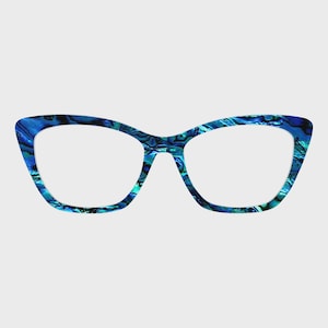 May include: Cat-eye style eyeglasses with a vibrant blue and teal marbled pattern. The frames have a glossy finish and a classic, feminine shape. The lenses are clear, and the overall design is modern and stylish.