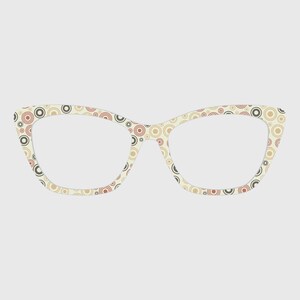May include: Cat-eye style eyeglasses with a cream-colored frame. The frame is decorated with a repeating pattern of brown, red, and black circles. The lenses are clear, and the overall design is retro and stylish.