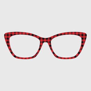 May include: Cat-eye shaped eyeglasses featuring a bold red and black buffalo plaid pattern across the entire frame. The design consists of a continuous checkered print that covers the front rims and the bridge of the eyewear accessory.