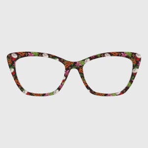 May include: Cat-eye style eyeglasses with a colorful pattern. The frames feature a dark brown base with a repeating design of red drums, pink flowers, and green leaves. The lenses are clear.