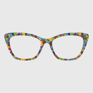 May include: Cat-eye style eyeglasses with a colorful patchwork pattern. The frames feature a mix of red, blue, yellow, and green squares and shapes, creating a vibrant and unique design. The lenses are clear, and the overall style is modern and fashionable.