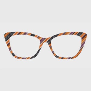 May include: Cat-eye glasses frames featuring a diagonal striped pattern in orange, black, and purple. The design includes repeating motifs of spider webs, small dots, and thin lines across the entire surface of the thick plastic frames.