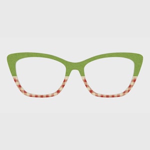 May include: Cat-eye shaped eyeglasses frames featuring a two-tone design. The upper portion of the frames is a solid light green, while the lower portion features a red and white gingham checkered pattern across the bottom rims.