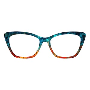 May include: Cat-eye style eyeglasses with a mosaic pattern in shades of blue, teal, orange, and yellow. The frames have a gradient effect, transitioning from orange to blue. The lenses are clear.