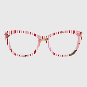 May include: Cat-eye eyeglasses with a red and white striped pattern. The frames are decorated with cartoon dachshunds, cherries, and hot dogs. The glasses have a playful and whimsical design.