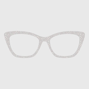 Puede incluir: Un par de gafas con un estampado floral gris claro. Las monturas tienen forma de ojo de gato. Las lentes son transparentes. El estampado floral está compuesto por pequeñas flores y hojas.