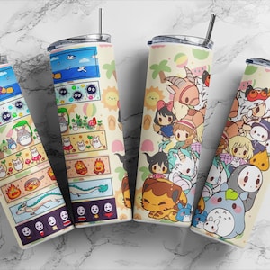 May include: Four stainless steel tumblers with colorful anime-style illustrations. Each tumbler features a different design, including characters and scenes from various animated films. The tumblers have black straws and lids.