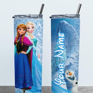 May include: Two stainless steel tumblers with lids and straws. One features Anna and Elsa from Frozen, the other has a winter scene with Olaf and the text "Your Name" in blue script against a glittery background.