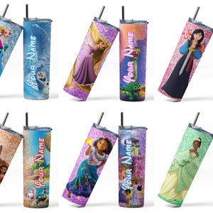 May include: A collection of personalized stainless steel tumblers featuring various Disney characters. Each tumbler has a glittery finish, a black straw, and the text "Your Name". Characters include Elsa, Anna, Rapunzel, Mulan, and others.