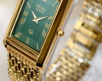Zegarek vintage Seiko Tank, złoty, elegancka zielona tarcza, cyfry rzymskie