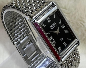 Vintage Seiko Slim Tank  Black Dial silver Case Refurbished Unisex silver tone Watch