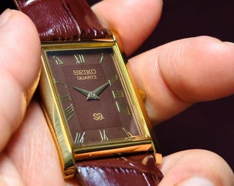 Reloj vintage Seiko Slim Tank, esfera marrón, caja en tono dorado con aspecto clásico, reloj unisex.