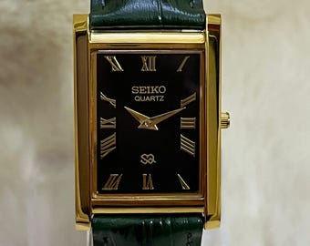 Vintage Seiko Slim Tank Black dial  gold tone  Rectangular Case Wrist Watch