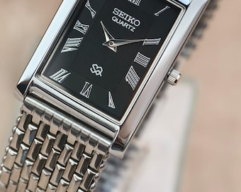 Vintage Seiko Slim Tank Watch Black Dial silver Rectangular Case unisex Wrist Watch