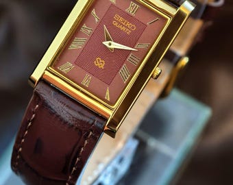 ヴィンテージ セイコー マルーンダイヤルウォッチ、ゴールドタンク、ローマ数字