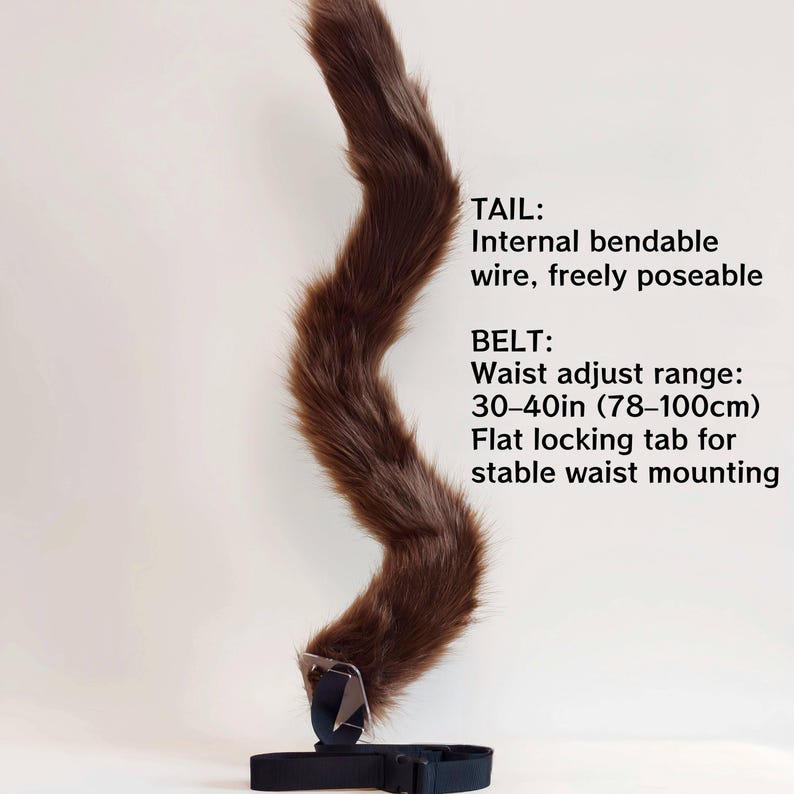 May include: A long, brown faux fur tail with an internal bendable wire for posing. It attaches to a black belt with a flat locking tab. Text reads: TAIL: Internal bendable wire, freely poseable. BELT: Waist adjust range: 30-40in. Flat locking tab.