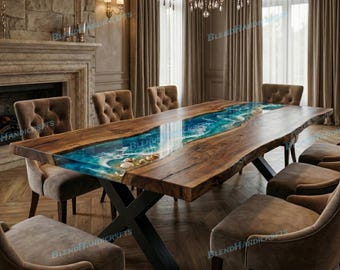 May include: A large, live-edge wooden dining table with a blue resin river design. The table features a black metal base and is surrounded by upholstered chairs. Seashells are embedded in the resin. A chandelier hangs above the table.