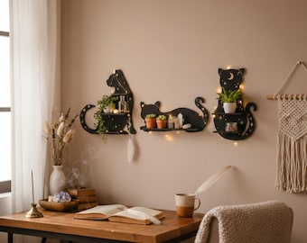 Estante de pared de madera negra con diseño de gato, luna dorada y cristal