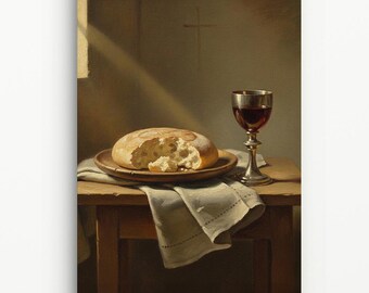 May include: A still life painting depicts a loaf of bread on a wooden plate, with a piece broken off. A silver goblet filled with red liquid sits beside it on a small wooden table, draped with a white cloth.