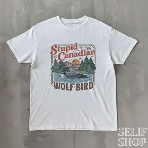 Stupid Canadian Wolf Bird Shirt, Funny Loon Nature Tee, Vintage Wilderness Graphic Top, Retro Canada Souvenir Shirt, Outdoor Adventure Gift