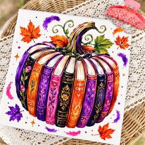 May include: A square canvas print featuring a pumpkin illustration composed of vertically arranged vintage books with ornate gold floral spines in shades of purple, orange, and black, accented by colorful autumn leaves and small star-like shapes.