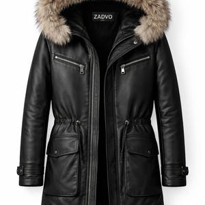 May include: Black leather parka with a fur-trimmed hood. Features include multiple zippered pockets, a drawstring waist, and the brand name "ZADVO" on the label. A stylish winter coat.
