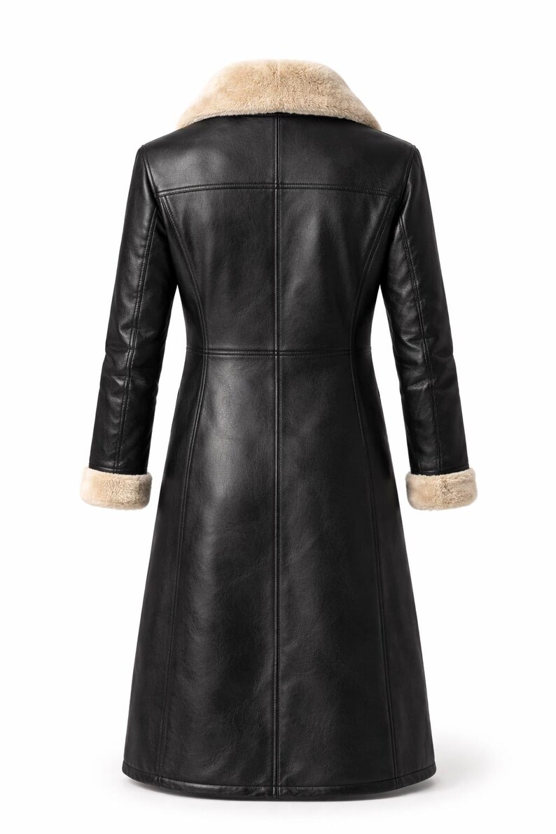 May include: A black leather coat with a beige faux fur collar and cuffs. The coat has a long, tailored silhouette with visible stitching details. The back view showcases the coat's design and structure, suitable for cold weather.
