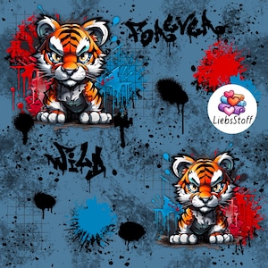 Peut inclure: Tissu bleu avec un motif de style graffiti. Il présente deux tigres de dessin animé avec des rayures orange et noires. Le fond présente des éclaboussures de peinture rouge, bleue et noire, avec les mots "FOREVER" et "WILD" en noir.