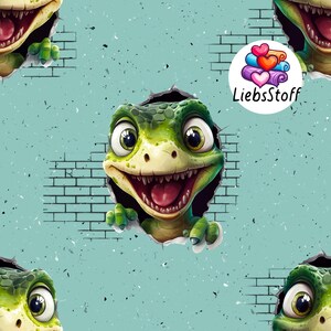 Könnte beinhalten: Ein sich wiederholendes Muster mit Cartoon-Dinosauriern, die aus einer Ziegelmauer brechen. Die Dinosaurier sind grün mit großen Augen und offenem Mund. Der Hintergrund ist helltürkis mit einer strukturierten Textur. Der Text "LiebsStoff" befindet sich in einem Kreis.