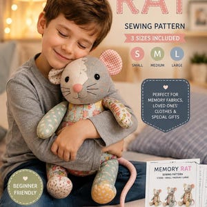 A young boy happily hugging a medium-sized patchwork memory rat toy in front of a printed pattern sheet.