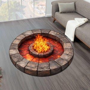Peut inclure: Un tapis rond avec un motif de foyer. Le tapis présente une bordure en forme de pierre entourant un centre rouge et orange avec un motif de flamme. Le tapis est conçu pour ressembler à un foyer avec une flamme réaliste.