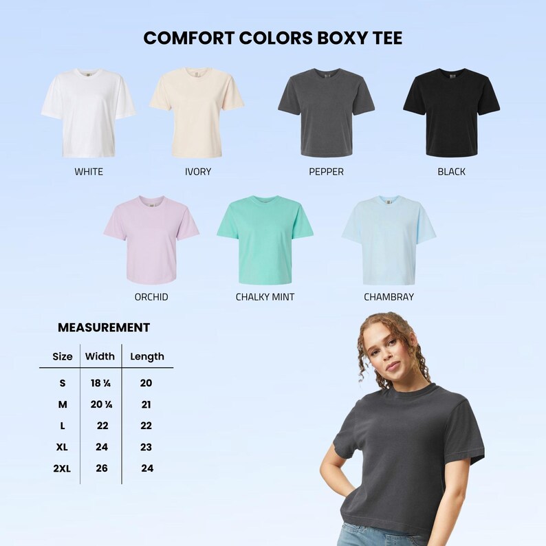 May include: A Comfort Colors boxy tee available in white, ivory, pepper, black, orchid, chalky mint, and chambray. A measurement chart lists sizes S through 2XL with widths from 18.25 to 26 inches and lengths from 20 to 24 inches for each size.