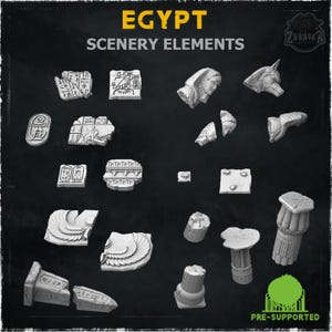 Peut inclure: Ensemble d'éléments de décor égyptiens pré-supportés, comprenant des tablettes hiéroglyphiques, des bustes et des fragments architecturaux. Les éléments sont dans des tons de gris et de blanc, avec des détails complexes. Le texte "EGYPT SCENERY ELEMENTS" est en haut.