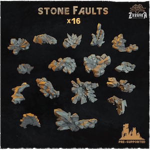 Puede incluir: Dieciséis miniaturas de fallas de piedra grises, pre-soportadas, para juegos de mesa. La imagen presenta varias formaciones rocosas con bordes dentados sobre un fondo oscuro. El texto en la parte superior dice "STONE FAULTS x16".