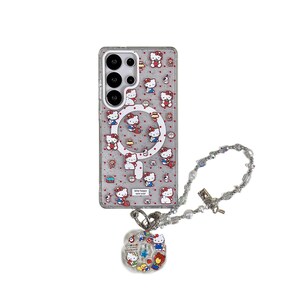 Może przedstawiać: Przezroczyste etui na telefon z motywami Hello Kitty i czerwonymi akcentami. Etui ma magnetyczny pierścień i napis "kitty happy new year". Widoczny jest r&oacute;wnież srebrny naszyjnik z koralik&oacute;w z zawieszką Hello Kitty.