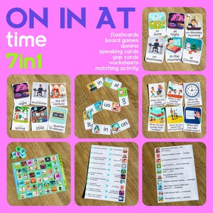 May include: Educational flashcards and board games for learning English grammar. The image shows various cards with illustrations and text, including time-telling, prepositions, and sentence structures. The set includes dominoes and worksheets.
