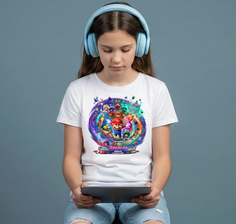 May include: A white ceramic mug with a black handle and the text "But First, Coffee" in a handwritten style. The mug is on a white surface. The mug is approximately 4 inches tall.