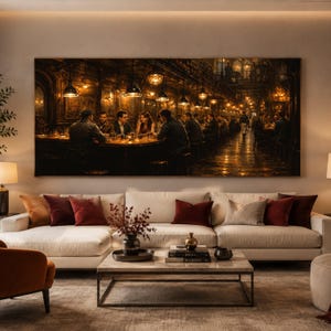May include: A large rectangular canvas print showing a restaurant interior. The artwork depicts people at tables and a bar, lit by warm, hanging lights. The colour palette is dominated by browns and golds, creating a cosy atmosphere.