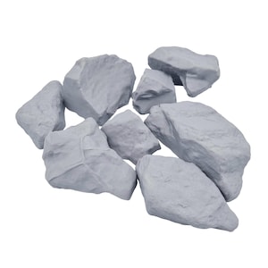 May include: A cluster of light grey rocks of varying sizes and shapes. The rocks have a rough, textured surface. They are arranged in a pile against a white background, suggesting a natural or decorative theme.