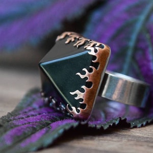 Black pyramid shaped obsidian set in copper flames with a sterling silver band