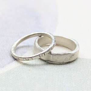Handmade sterling silver thick and thin minimalist rings with a brushed matte finish