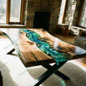 May include: A handcrafted wooden coffee table with a river-like design. The table features a live edge, with a clear epoxy resin river in shades of blue and green. The table is supported by black metal legs. The table measures approximately 60 inches long.