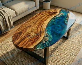 May include: Oval coffee table with a wooden top and a blue resin river design. The wood has a natural grain pattern, and the resin is a vibrant blue. The table has black metal legs and sits on a woven rug.