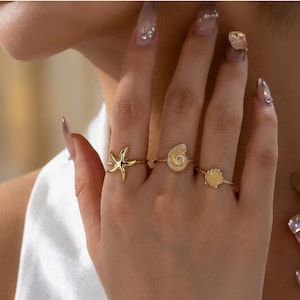 Set de anillos dorados de estrella de mar y concha, anillos apilables inspirados en el océano, joyería de playa