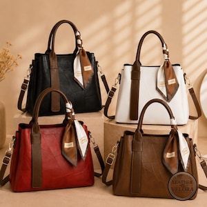 May include: Four leather handbags in black, white, red, and brown. Each bag has a top handle, a detachable shoulder strap, and a decorative scarf tied to the handle. The bags have a rectangular shape with a structured design. The brand name "LEATHER VELORA" is visible.