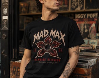 Strange Bloom Graphic T-Shirt | Retro 80s Horror Tee | Distressed Grunge Flower Shirt
