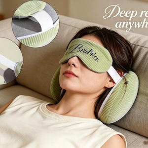 May include: A sage green corduroy sleep mask with the name Beatrice embroidered in black script, featuring a white elastic strap and matching side cushions. The text Deep rest anywhere is visible in the upper right corner of the image.
