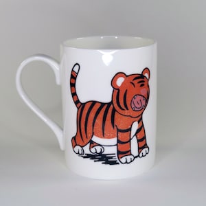 Little Tiger says Grrr! bone china mug with original lino print by Patrick Kennedy, perfect for when you are feeling tigerish!