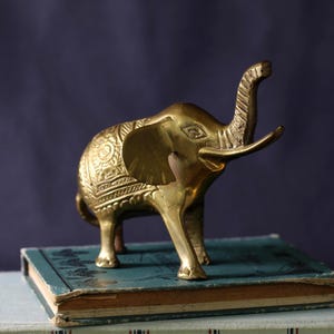 Vintage Indian brass elephant figurine | handcrafted decorative sculpture | 1960s boho eclectic decor | floral engraved patterns, patina